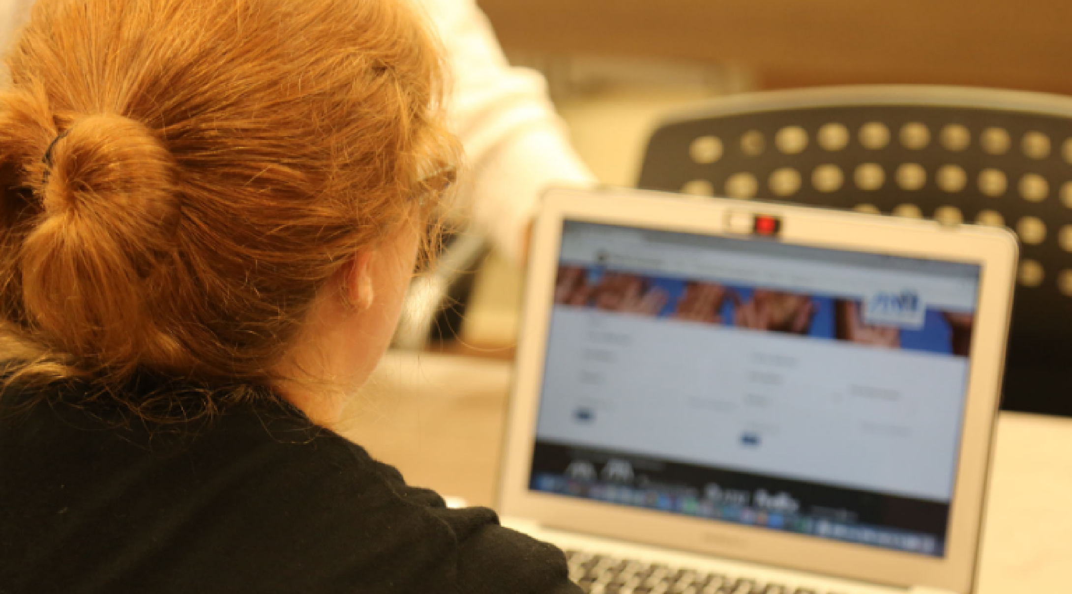 A woman at her computer
